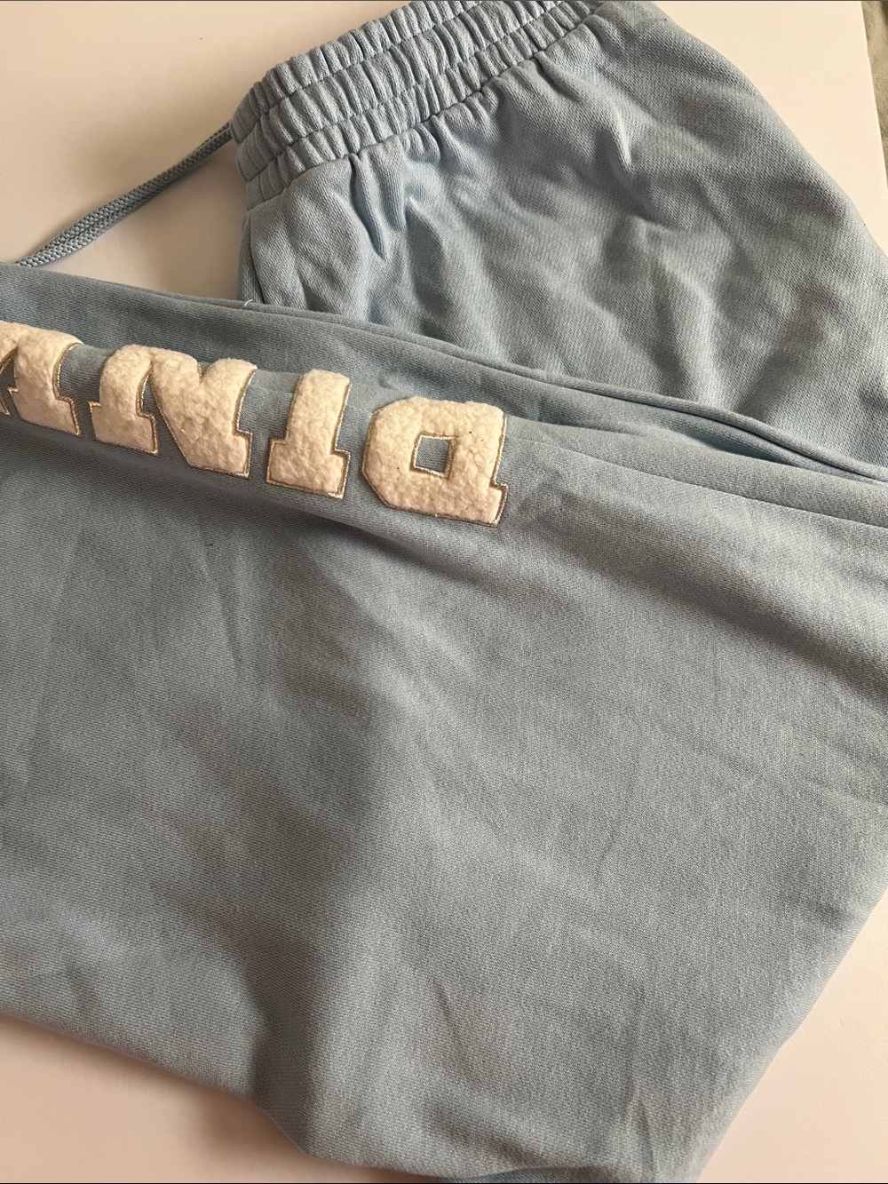 PINK women’s Light Blue Sweatpants with White Lettering